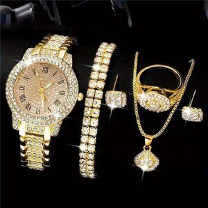 Set of Jewelry Including a Golden Watch, Ring, Necklace, Earrings